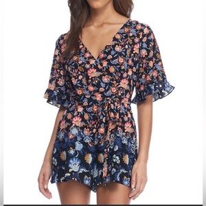 Trixxi blue floral romper short frill sleeves V neck neckline size small EUC